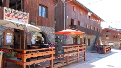The terrace of Le Dos Rond Restaurant in summer